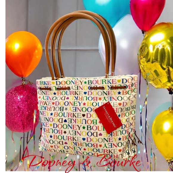 Dooney & Bourke Handbags - NEW DOONEY & BOURKE TASSEL TOTE IN COATED CANVAS WITH LEATHER TASSELS & HANDLES